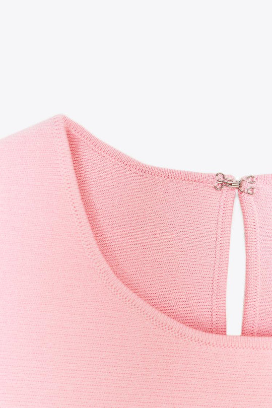 TOP EN MAILLE PÉPLUM AVEC LACETS