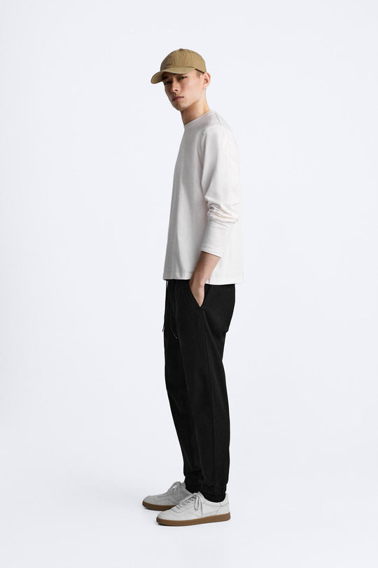 PANTALON DÉLAVÉ AVEC TAILLE JOGGING