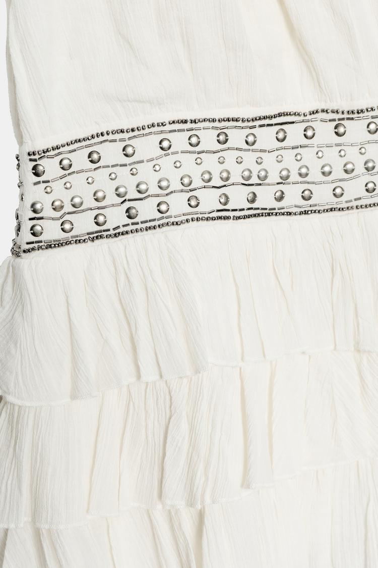 ROBE GAZE VOLANTS CLOUS
