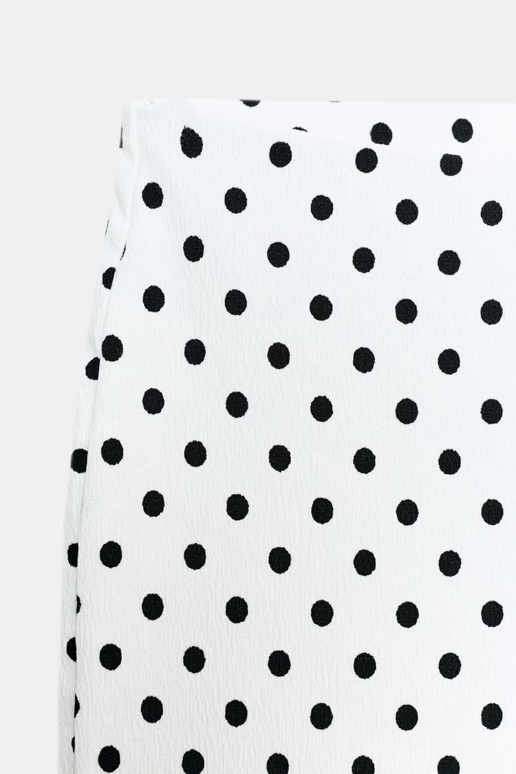 PANTALON FLARE STRETCH À POIS