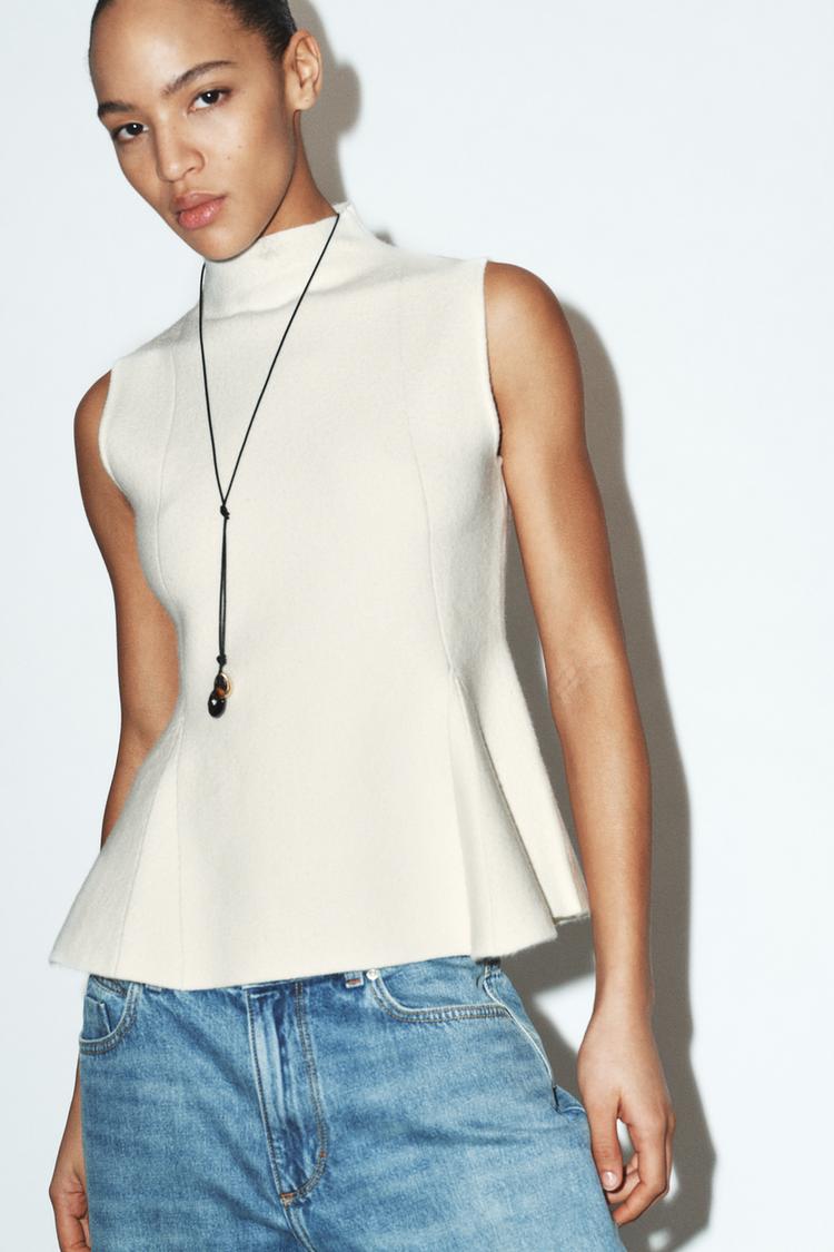 TOP EN MAILLE PÉPLUM