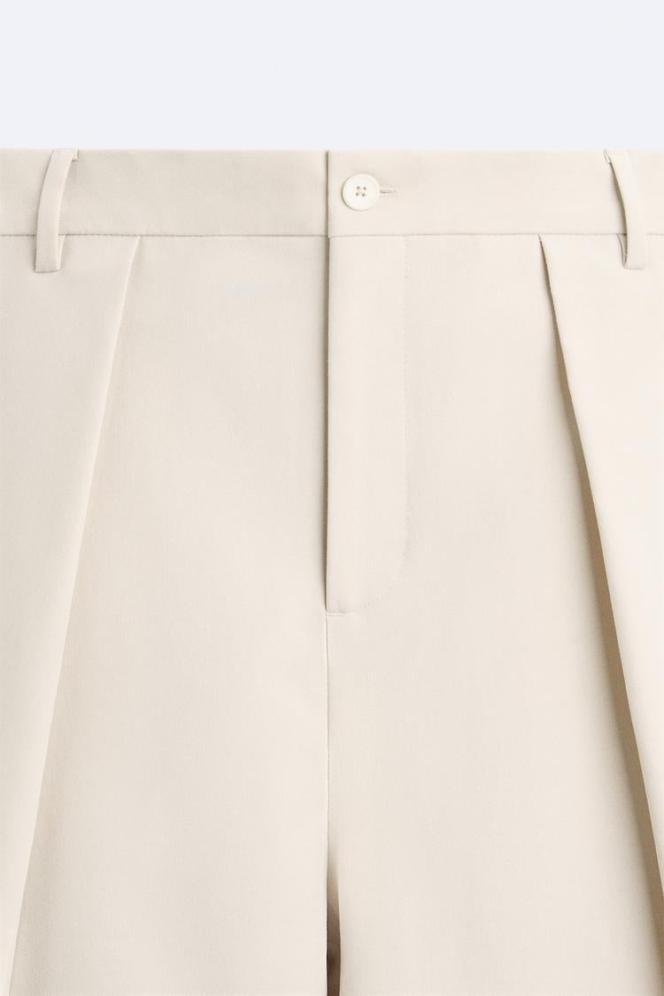 Pantalon coupe large a plis - Beige