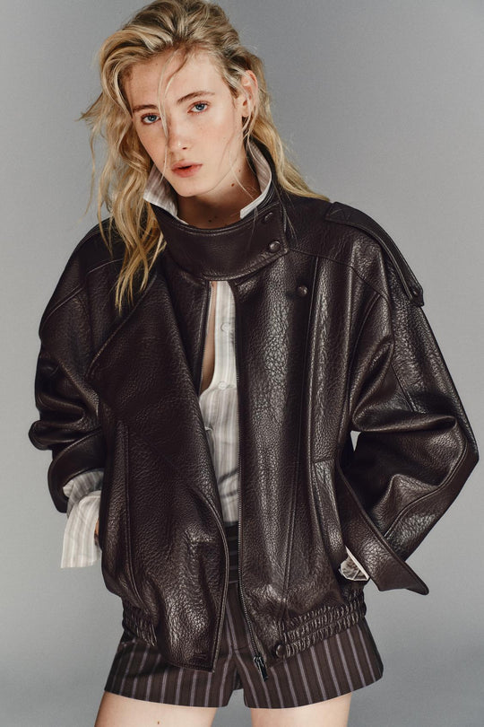 BLOUSON EN MATIÈRE SYNTHÉTIQUE