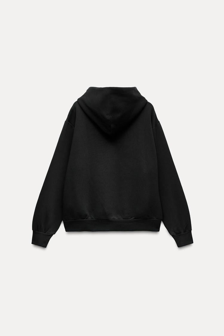 Sweat à capuche avec poches - Noir