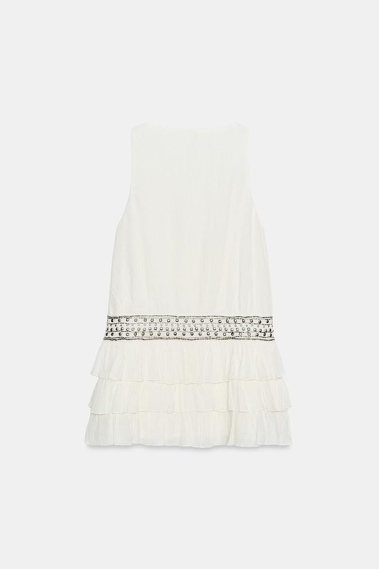 ROBE GAZE VOLANTS CLOUS