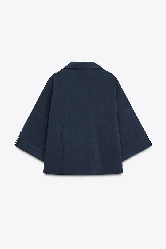 CHEMISE MANCHES COURTES LARGES