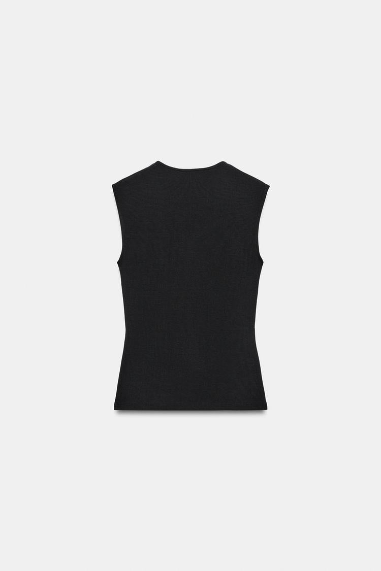 T-SHIRT SANS MANCHES