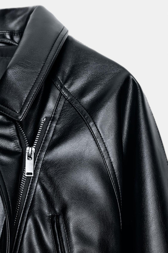 BLOUSON EN MATIÈRE SYNTHÉTIQUE AVEC CEINTURE