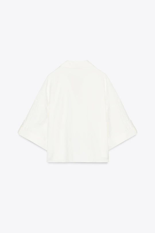 CHEMISE MANCHES COURTES LARGES
