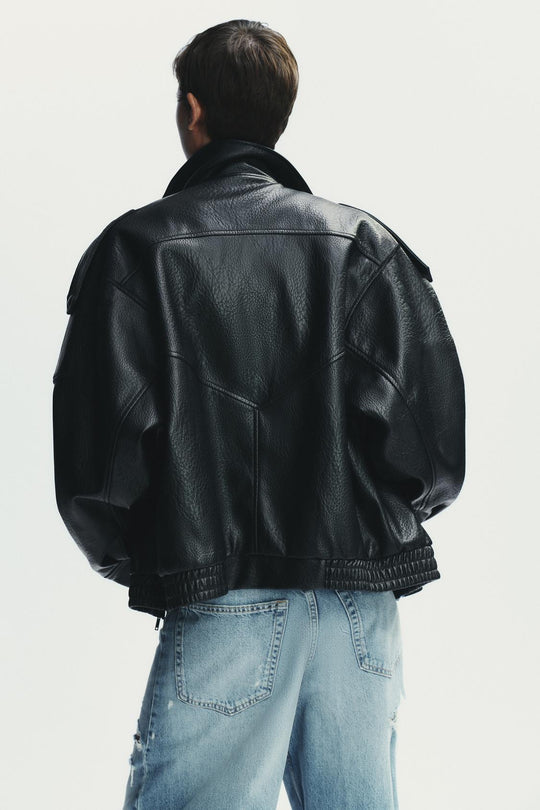 BLOUSON EN MATIÈRE SYNTHÉTIQUE