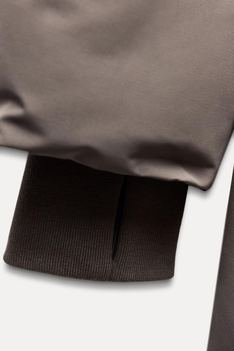 Doudoune longue verte à capuche imperméable  et coupe vent - Noir